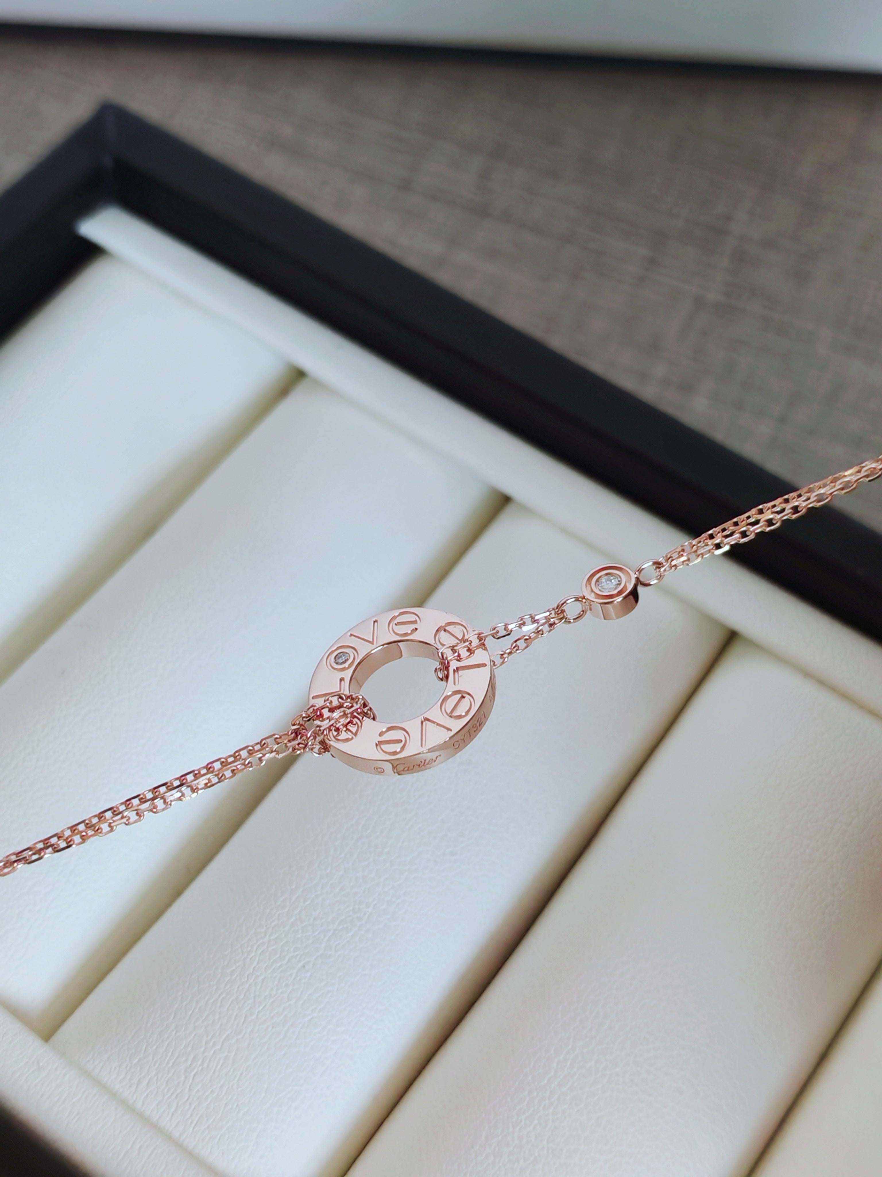 LOVE bracelet, on a chain, 2 pink sapphires
