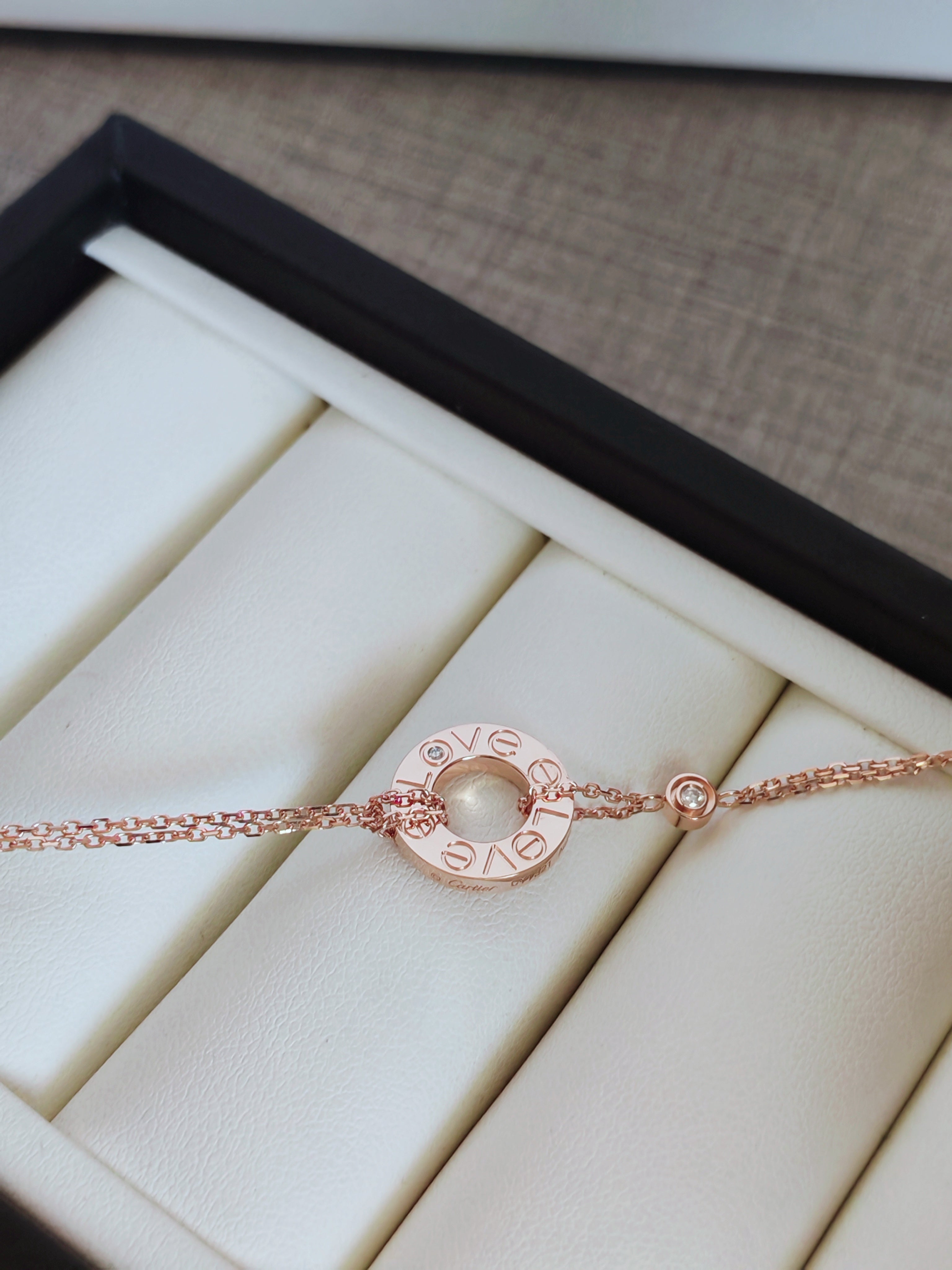 LOVE bracelet, on a chain, 2 pink sapphires