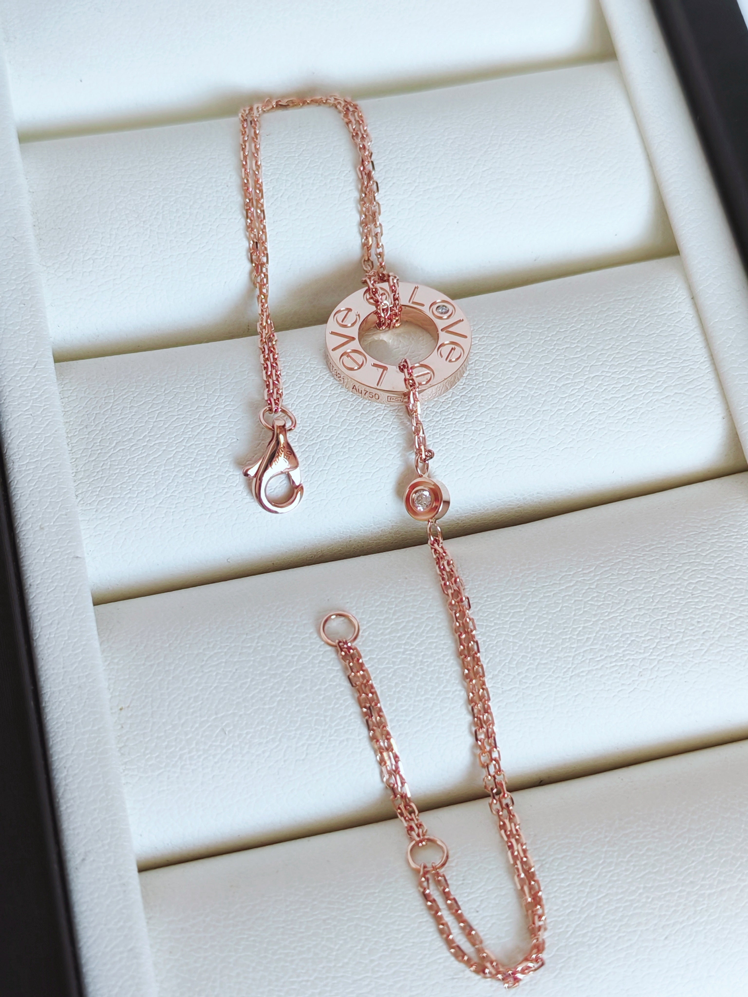 LOVE bracelet, on a chain, 2 pink sapphires