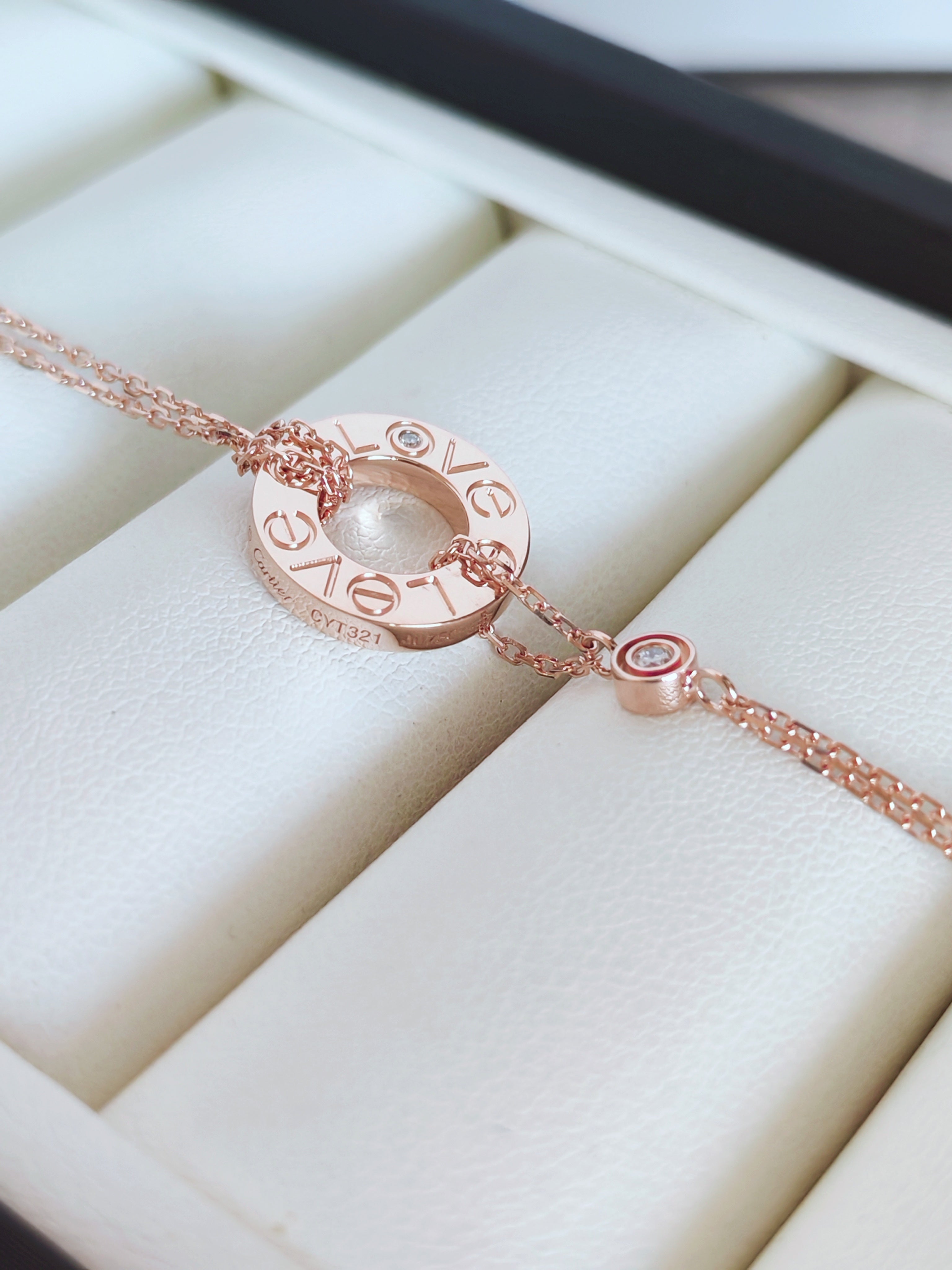 LOVE bracelet, on a chain, 2 pink sapphires
